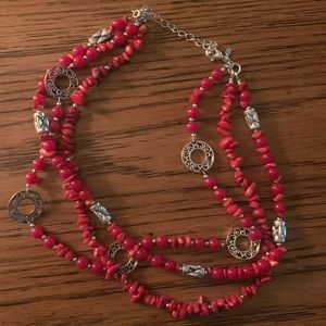 Three strand red stone and silver accent necklace